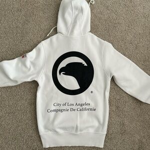 White and black COMPAGNIE DE CALIFORNIE zip-up